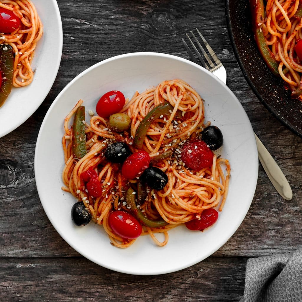 plate of olive and dukkah pasta