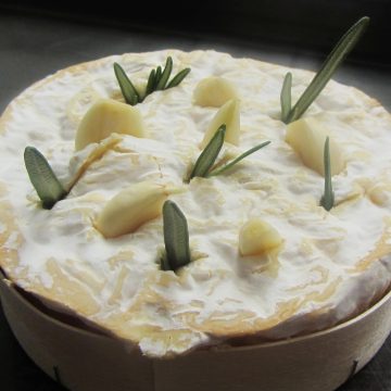 Baked tunworth with garlic and rosemary