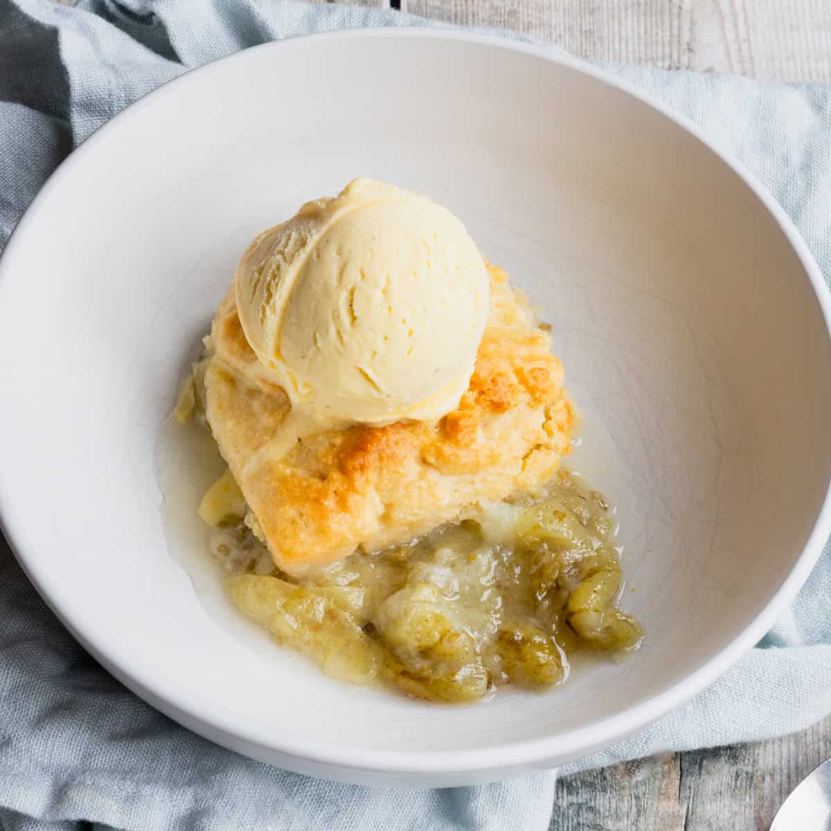 gooseberry cobbler topped with ice cream