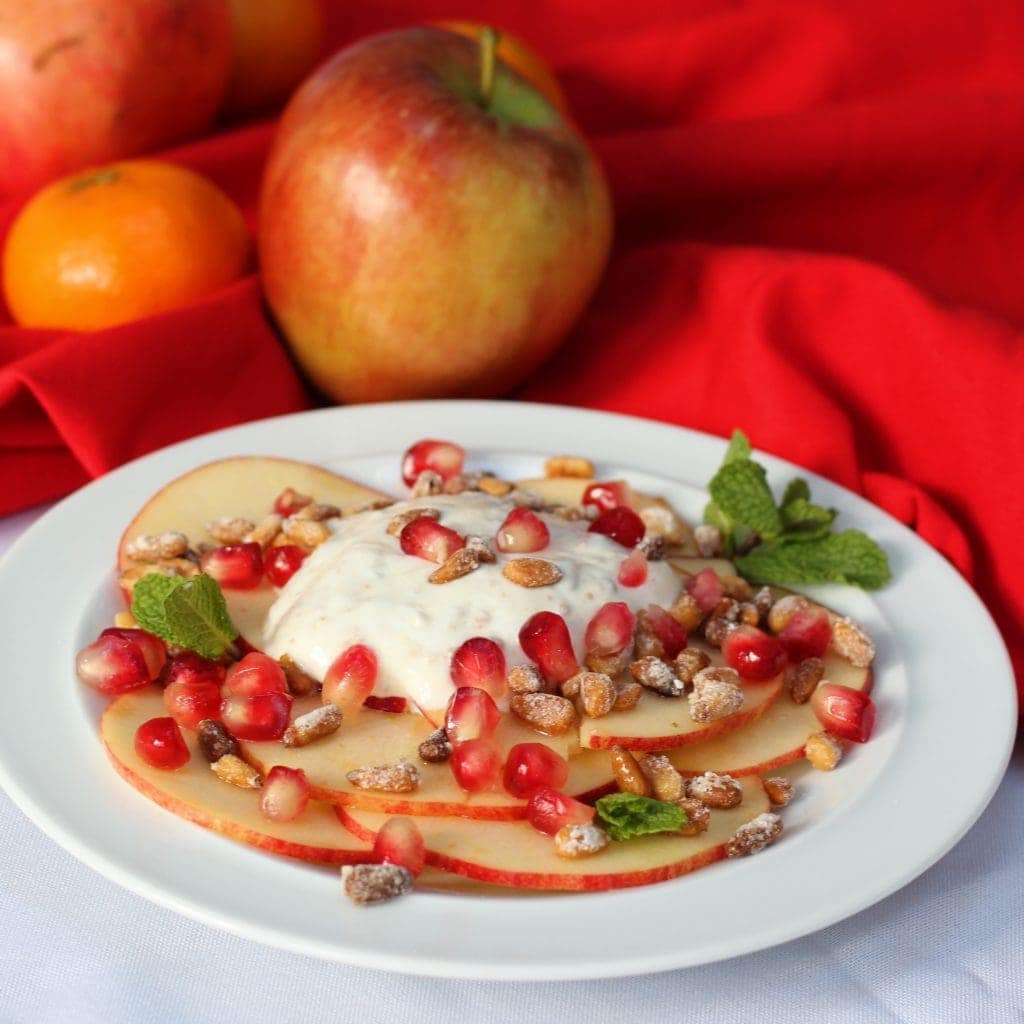 Apple carpaccio on a white plate