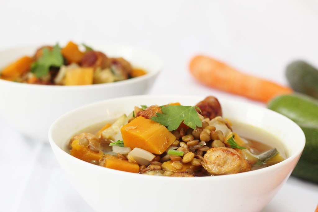 warming vegetable sausage and lentil soup bowls