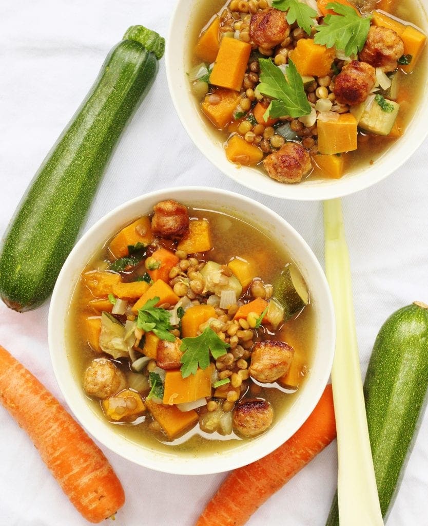 Two bowls of sausage lentil and vegetable soup