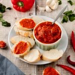 bowl of ajvar with bread