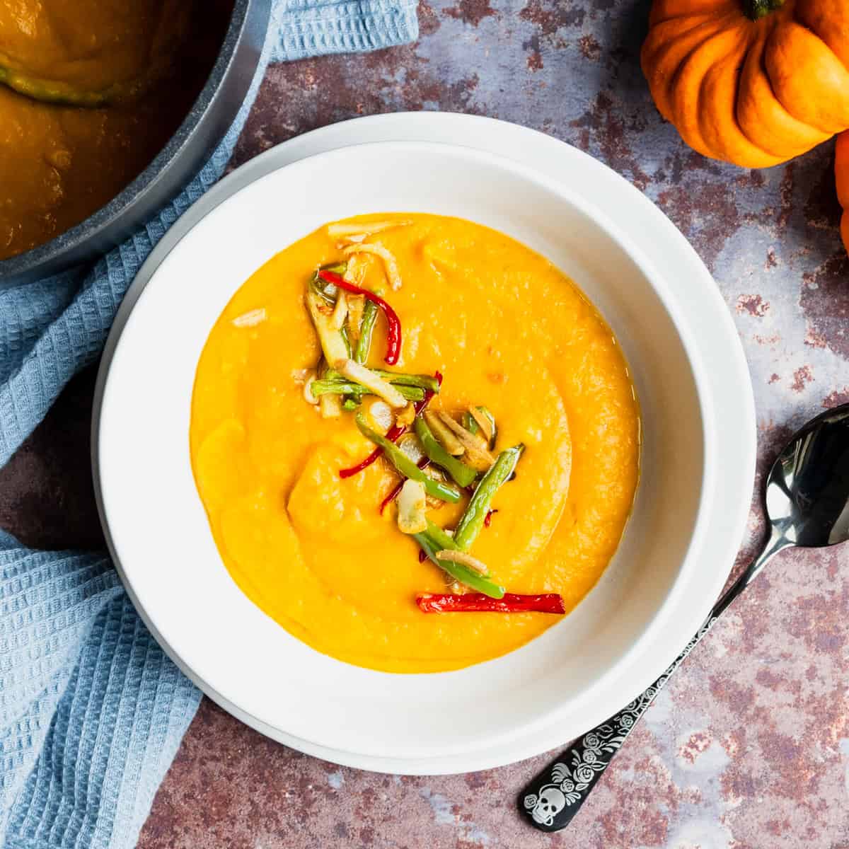 bowl of coconut pumpkin and ginger soup