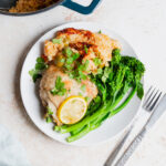 plate of Greek one pot chicken and rice with broccoli